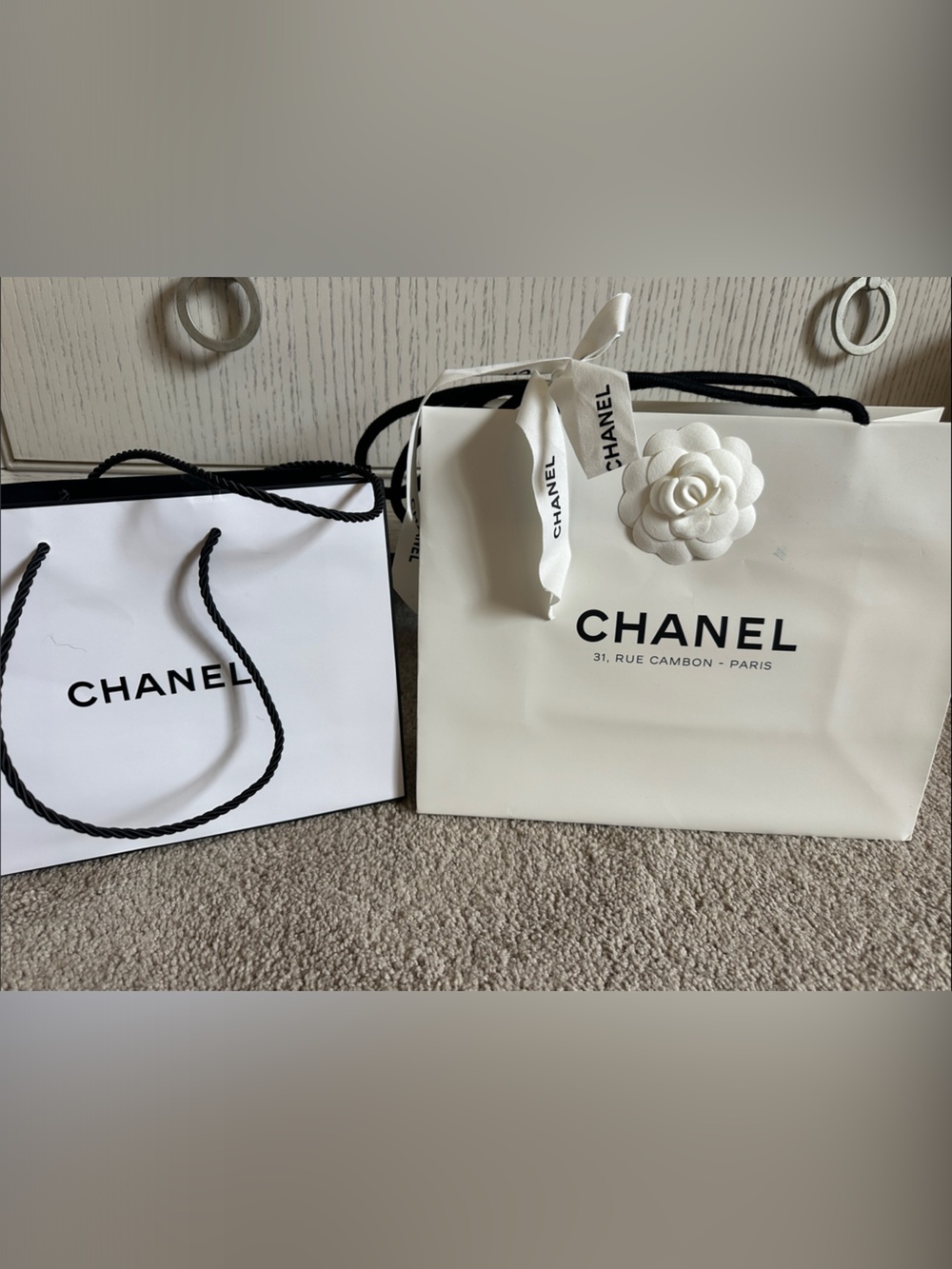 CHANEL White Shopping Bag with Black Logo, Ribbon and Camellia